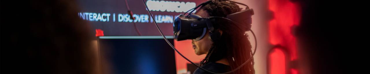 Student wearing VR headset in Technology Showcase